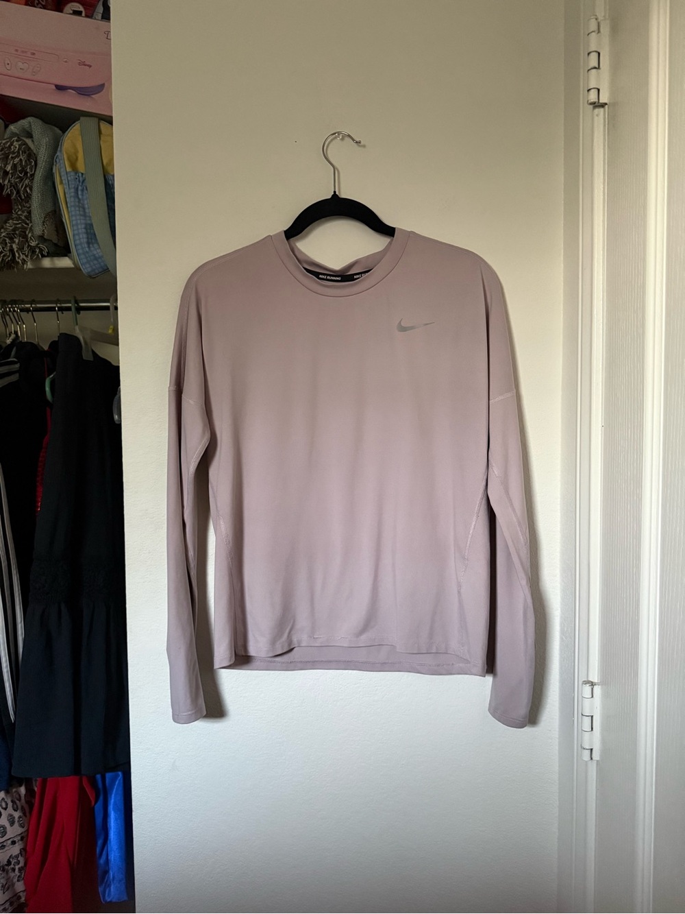 nike light pink athletic shirt